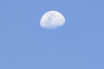 half moon during the day