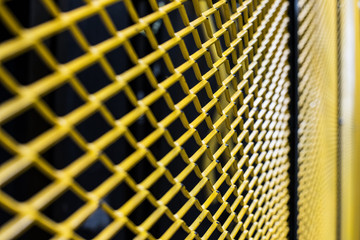 Yellow Fence. yellow cage.yellow grille. selective focus