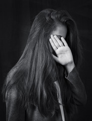 Monochrome close up portrait of young beautiful girl