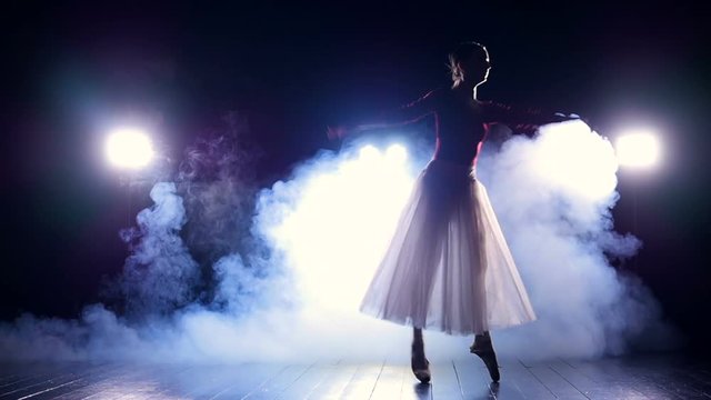 Girl dancing in the fog. No face. Close-up. Slow motion. HD.
