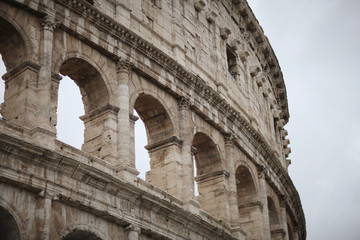 Fototapeta premium Fragment of the wall of the ancient Colosseum. Rome, Italy