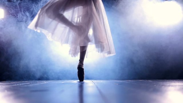 Close up of the girl dancing in pointe shoes. No face. Slow motion. HD.