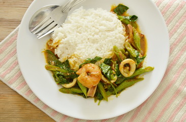 spicy stir fried shrimp and squid curry eat couple with rice