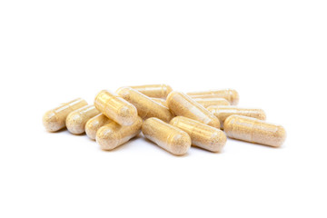Natural medicine capsules isolated on a white background