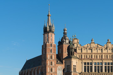 Fototapeta na wymiar Cracow (Krakow), Poland - Landmarks of the Old Town - St. Mary's Basilica and the Cloth Hall