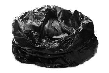 Crumpled, open black plastic garbage bag, isolated on white background