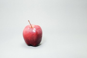 Real red apple on white background