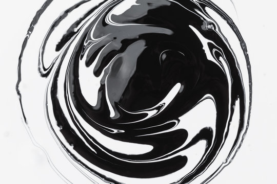 abstract background, white and black mineral oil paint on water