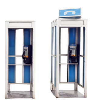 Two isolated vintage outdoor phone booths.