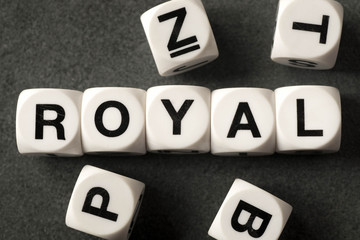 word royal on toy cubes