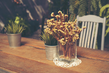 Bouquet of dried flowers for decoration in coffee shops, vintage filter image