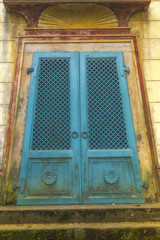 turquoise old Egyptian gate to a tomb