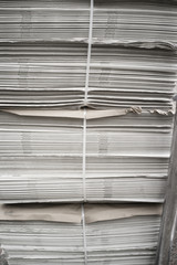 Stack of newspapers.