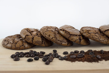 Black Brownie Cookies on wooden chopping board