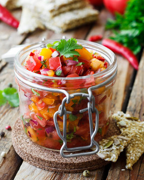 Tomato Salsa With Chili In A Glass Jar