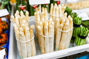 A lot of fresh asparagus on sale in farm food eco market