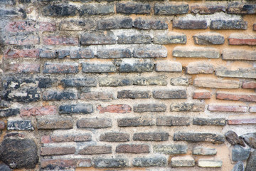 Brick wall of the castle wall in Toledo, Spain