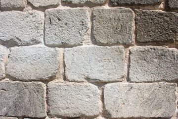 Brick wall of the castle wall in Toledo, Spain