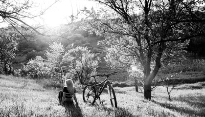 Fototapeta na wymiar Girl cyclist in nature