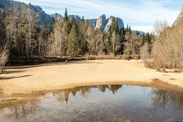 Three Brothers Rock Formation in Yosemite Reflected in Merced River