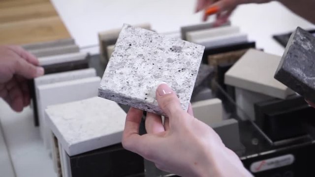Samples of quartz material for the manufacture of countertops. The choice and offer to customers-suppliers-managers
