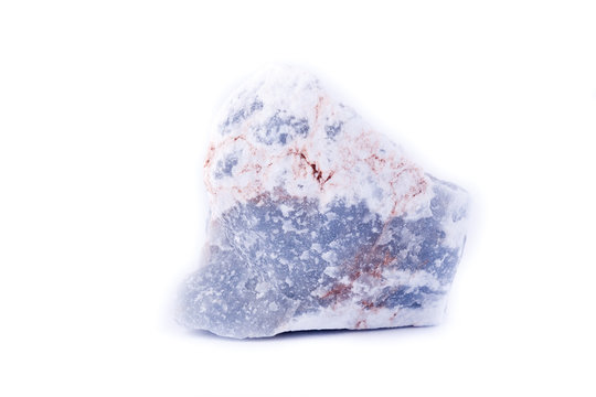 macro mineral anhydrite stone on a white background