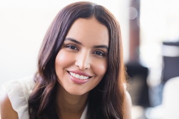 Close up portrait of smiling businesswoman