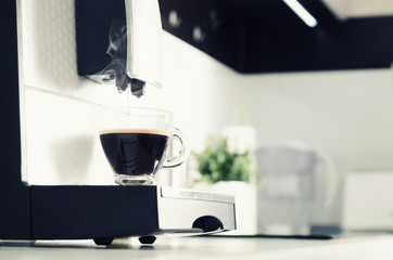 Professional home coffee maker in modern kitchen
