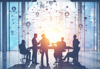 People in conference room and network