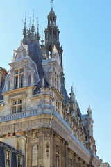 Fototapeta na wymiar View on white corner palace building wall with blue sky, paris city, france