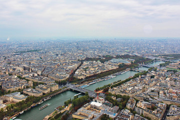 Fototapeta premium Panoramic view on paris city, seine river and grand palais, from the top of eiffel tower, france