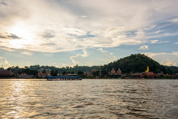 Beautiful natural landscape and tourist boat cruising the beauty of the Mekong River coast at...