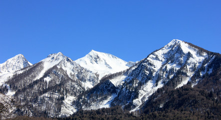 Fototapeta na wymiar Snowy high mountains landscape.