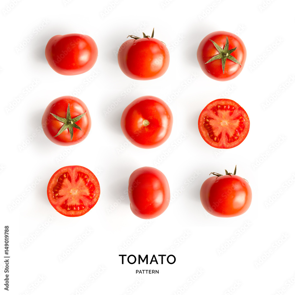 Wall mural Seamless pattern with tomatoes. Tropical abstract background. Tomato on white background.