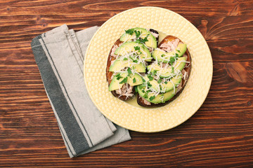 Open avocado sandwiches with tuna on whole grain bread