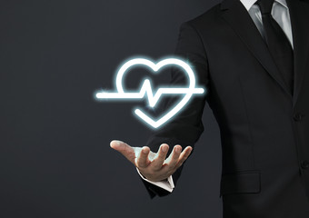 Businessman magical touch concept - heart beat