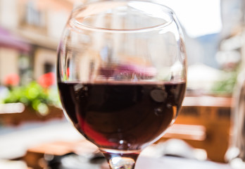 Blurred red wine background. Selective focus.