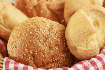 Different fresh bread loaves, closeup