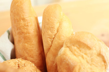Different fresh bread loaves, closeup