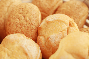 Different fresh bread loaves, closeup