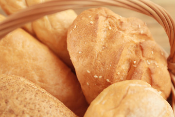 Different fresh bread loaves, closeup