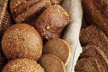 Different fresh bread loaves, closeup