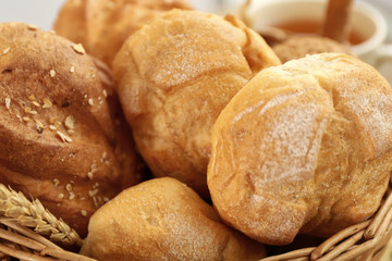 Different fresh bread loaves, closeup