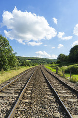 Fototapeta na wymiar Railway tracks passing through English countryside.