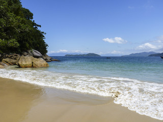Blue water in the beautiful beach the emerald color 