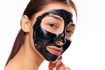 young woman with a medical mask on her face