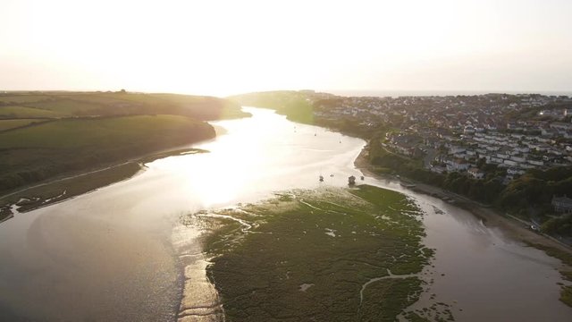 Scenic sunset over Gannel River, UK aerial