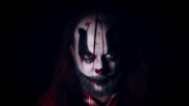 4k Halloween Horror Clown Man with Red Balloon