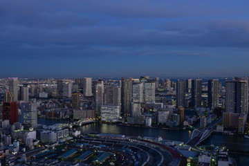 Naklejka na ściany i meble Tokyo cityscape with dense buildings at dusk 