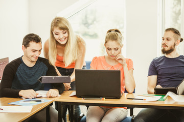 Obraz premium Students and teacher tutor in classroom